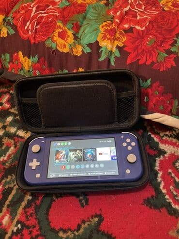 принтер wifi: Портативная игровая консоль Nintendo Switch Lite фиолетового цвета — 1