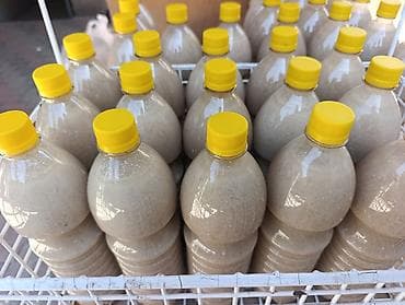 Жарма максым аралаш напитки в пластиковых бутылках с жёлтыми