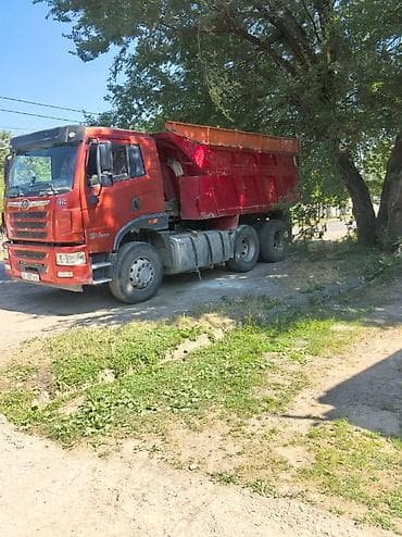 Самосвал FAW (6x4) Описание: - Трехосный самосвал с