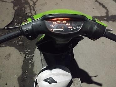 дрифт скутер: Скутер/мопед малокубатурный, ярко‑зеленый цвет. Компактный городской — 7