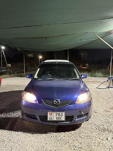 багаж на демио: Mazda Demio: 2003 г., 1.3 л, Автомат, Бензин, Хэтчбэк — 5