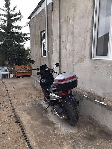глушитель макси: Скутер/мопед 165 см³ (визуально — спортивный городской). Основные — 3
