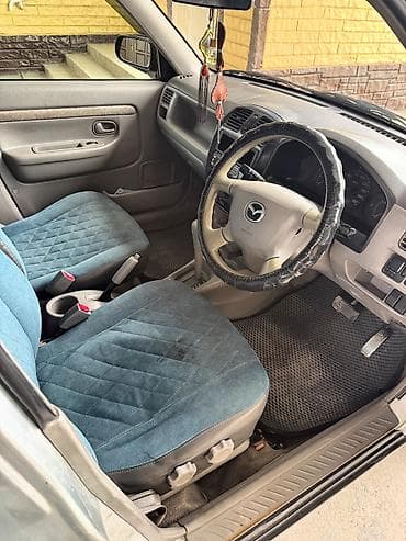авто масла: Mazda Demio: 2001 г., 1.3 л, Автомат, Бензин, Хэтчбэк — 5