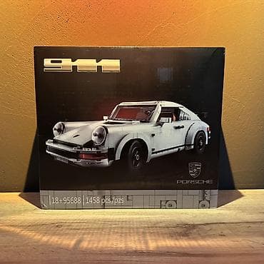 Конструкторы лего 1) Гоночный болид red bul 2) Porsche 911 3)