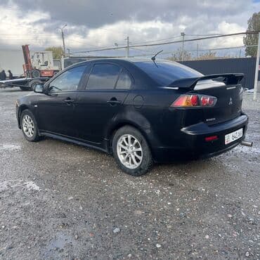 срочно продаю в связи с переездом: Mitsubishi Lancer: 2013 г., 2.4 л, Механика, Газ, Седан — 2