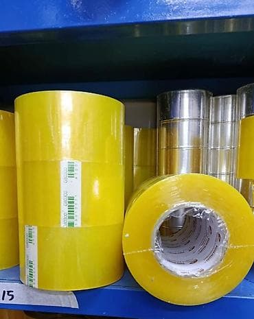 Клейкая упаковочная лента (скотч), прозрачная с лёгким жёлтым