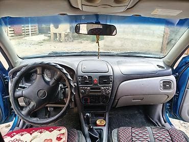 Унаа сатуу: Nissan Almera: 2001 г., 1.5 л, Кол менен иштөөчү, Бензин, Седан — 6