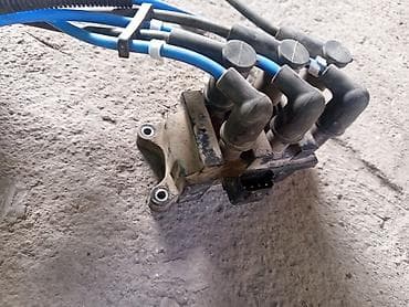 Автокосметика: Катушка зажигания Mazda 2001 г., Б/у, Япония — 1