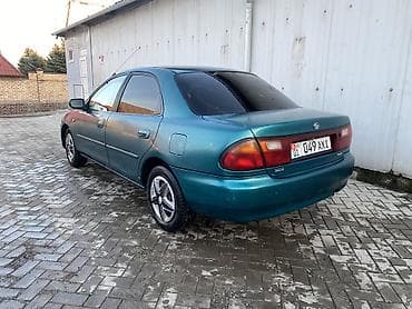 rx 590: Mazda 323: 1996 г., 1.6 л, Автомат, Газ, Седан — 4