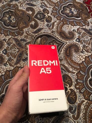 клетка для телефона: Redmi, Redmi 5A, Б/у, 64 ГБ, цвет - Черный, 2 SIM — 2
