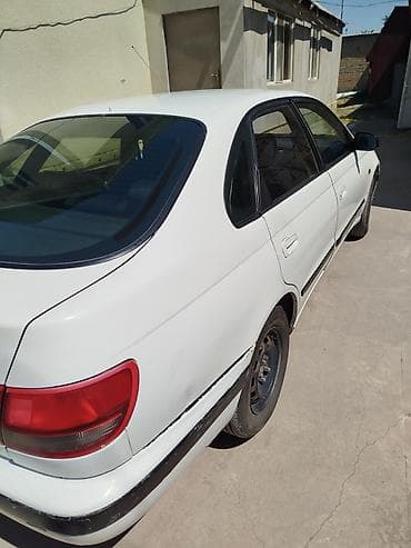 mazda 3 2007: Toyota Carina E: 1996 г., 1.6 л, Механика, Бензин, Седан — 4