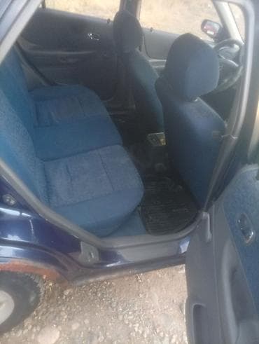 e klass: Mazda 323: 2000 г., Механика, Бензин — 9