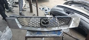 mini v: Решетка радиатора Mazda Оригинал — 3