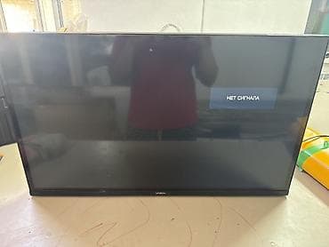 телевизор вестел: Телевизор YASIN, диагональ около 32" (визуально). Плоская LED‑панель с — 1
