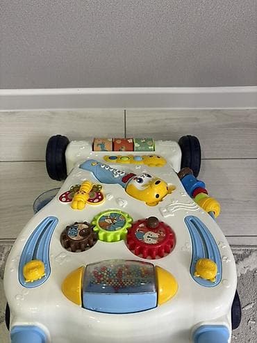 Детские ходунки: Развивающая каталка-ходунки для малышей - Устойчивая конструкция на 4 — 9