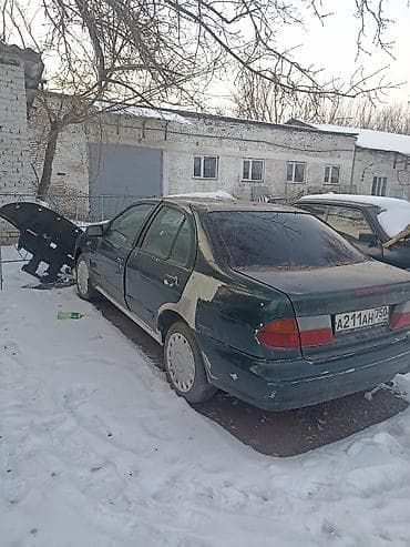 3 sfe: Nissan Almera: 1997 г., Механика, Седан — 3