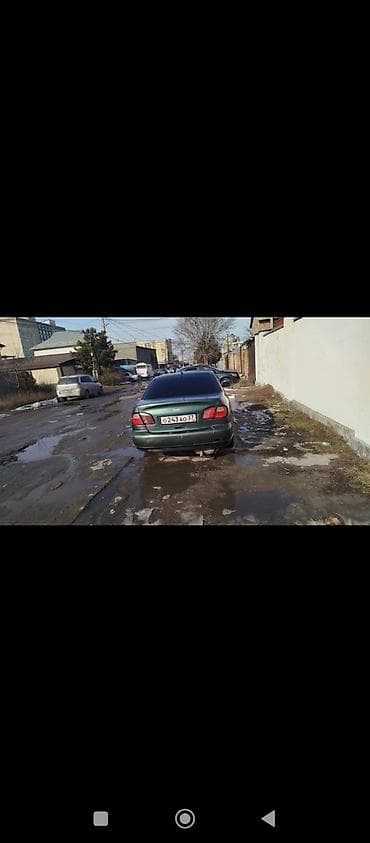 Nissan 100 NX: 1998 г., 1.8 л, Механика, Бензин, Седан