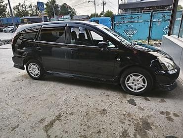 mini v: Honda Stream: 2003 г., 1.7 л, Автомат, Бензин, Минивэн — 9