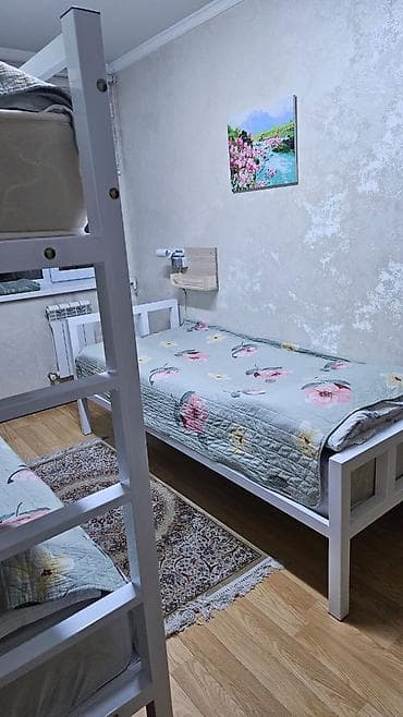 Комната для размещения 4–5 человек в частном доме. - Спальные места