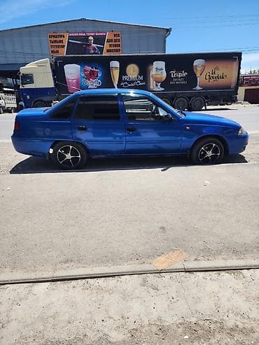 биайди е5: Daewoo Nexia: 2010 г., 1.6 л, Механика, Бензин, Седан — 4