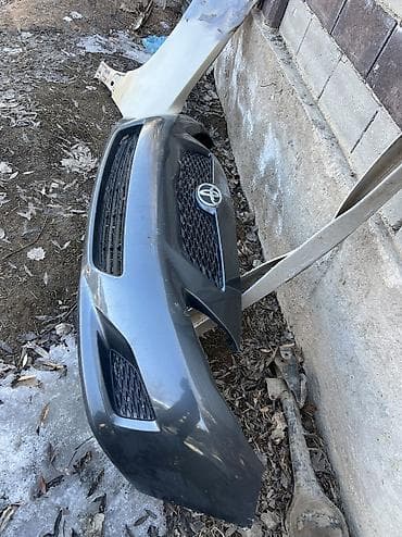 каропка виш: Бампер Toyota, Б/у, Оригинал — 2