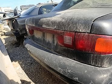 авто растрочка: Hyundai Sonata (ок. середины 90‑х), седан, черный цвет. Автомобиль на — 2