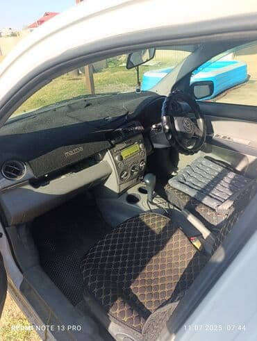 правое крыло: Mazda Demio: 2004 г., 1.3 л, Автоматтык, Бензин, Хетчбек — 10