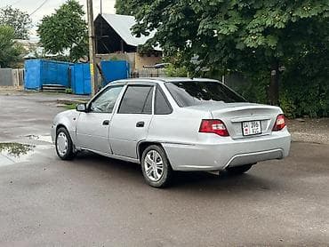 Унаа: Daewoo Nexia: 2011 г., 1.6 л, Кол менен иштөөчү, Бензин, Седан — 6