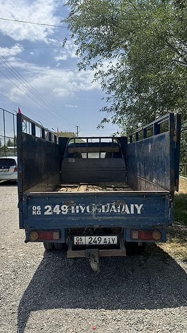 ресор на портер: Hyundai Porter, синий, малотоннажный бортовой грузовик. - Кабина — 4