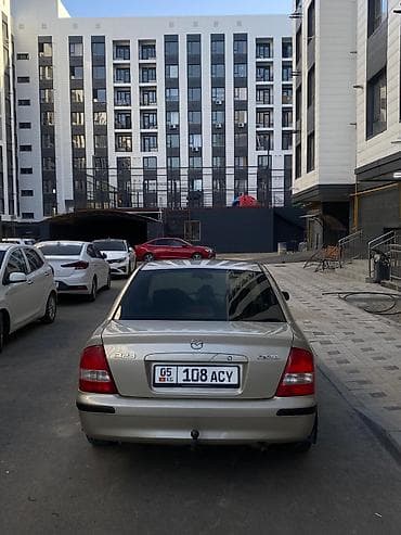 step rf3: Mazda 323: 1998 г., 1.5 л, Механика, Бензин, Седан — 6