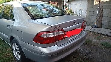 кондидер: Mazda 626: 2000 г., 1.8 л, Механика, Бензин, Седан — 3