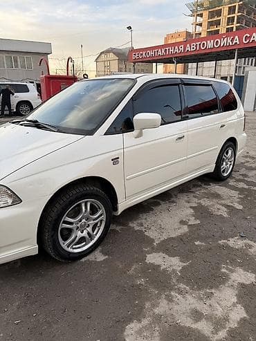 на вариант: Honda Odyssey: 2003 г., 2.3 л, Автомат, Газ, Минивэн — 3