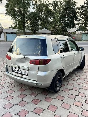 забыл: Mazda Demio: 2003 г., 1.3 л, Автомат, Газ, Хэтчбэк — 4