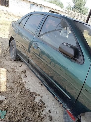 Транспорт: Nissan Almera: 1989 г., 1.8 л, Автомат, Седан — 2