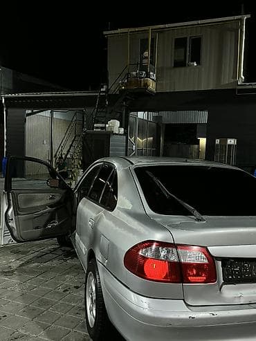 mazda 2: Mazda 626: 2000 г., 2 л, Механика, Бензин, Хэтчбэк — 9