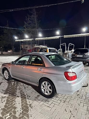 простой: Subaru Impreza: 2001 г., 2 л, Автомат, Газ, Седан — 6