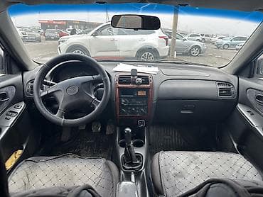 subaru forester 2007: Mazda Capella: 1998 г., 1.8 л, Механика, Бензин, Седан — 8