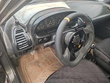 mitsubishi pojero: Mazda 323: 1994 г., Механика, Бензин — 5