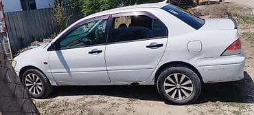 Транспорт: Mitsubishi Lancer: 2000 г., 1.5 л, Механика, Бензин, Седан — 5