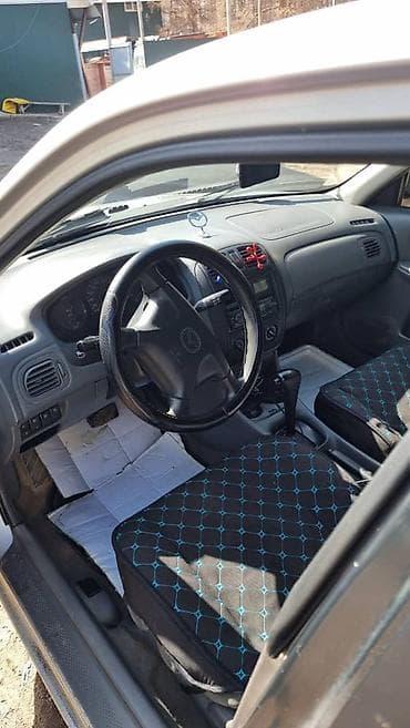 Mazda 323: 1999 г., Автомат, Универсал