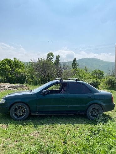 мазда демио задний стоп: Mazda Familia: 2001 г., 2 л, Автомат, Бензин, Седан — 1