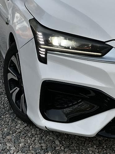 GAC: GAC Aion s белого цвета Кузов и внешность: - Динамичный дизайн — 5