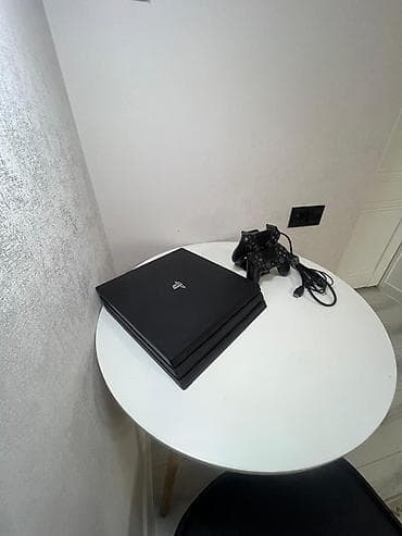 PlayStation 4 Pro (черный) Комплектация: - игровая консоль PS4 Pro