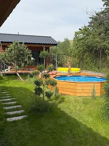 Үйлөр: Дом-дача с панорамным остеклением . - Фасад под брус, современная — 6