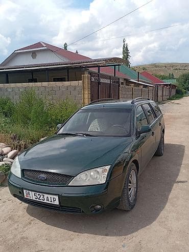 8: Ford Mondeo: 2003 г., 1.8 л, Механика, Газ, Универсал — 3