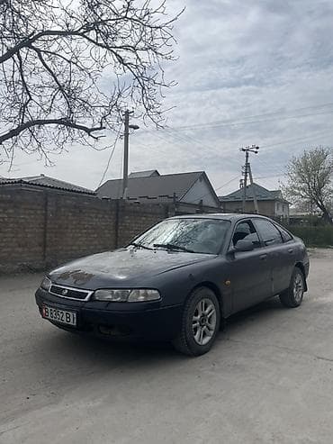 вампер 124: Mazda 626: 1995 г., 2 л, Ручные, Бензин, Седан — 5