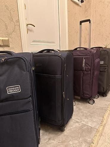 чехол для чемоданов: Чемодан, Б/у, Материал: Полиэстер, Средний (40 - 70 л), Водонепроницаемость, Вращающиеся колеса на 360°, Кодовый замок — 4