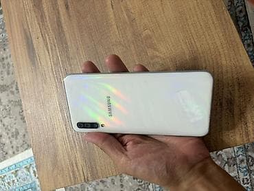 apple 12: Samsung Galaxy A50, цвет - Белый, 2 SIM — 1