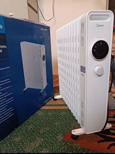 Масляный обогреватель Кол-во секций: 10 и более, Несколько режимов мощности