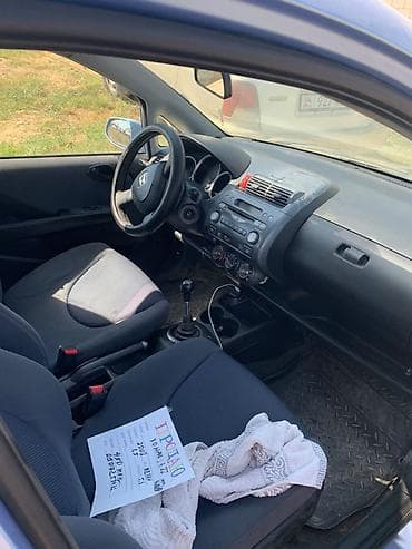 лента машина: Honda Fit: 2002 г., 1.3 л, Механика, Бензин, Хэтчбэк — 4